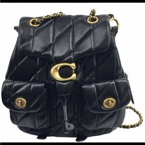 Chic Black Quilted Backpack with Gold Accents